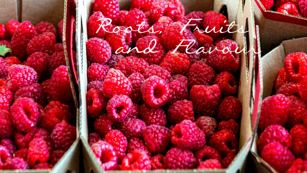 Punnet of raspberries with graphic text overlay.